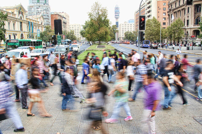 A bustling street of people walking around.